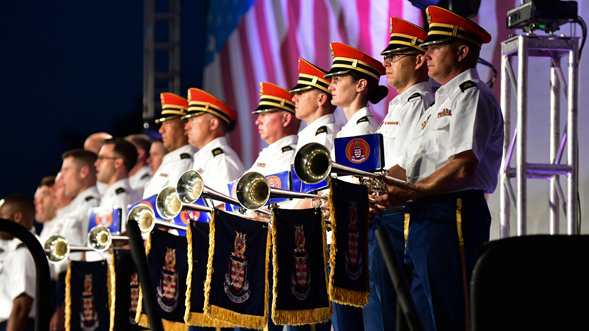 Members of the US Army Herald Trumpets stand ready to perform.